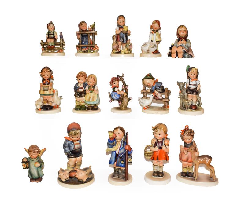 A tray of fifteen Hummel figures . Three figures with damage the rest in generally good condition