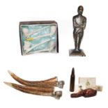 A tray of smoking related collectables including a pair of antler cigar cutters, table lighter