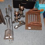A late 19th century steel fireside Arts & Crafts style companion set, together with a cast iron boo
