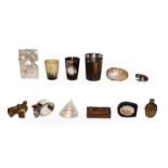 A tray of collectables including Scottish horn beakers, babies rattle, mother of pearl card case,