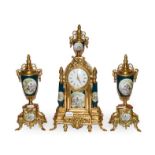 A reproduction French style gilt metal three-part clock garniture, with Quartz movement, 44cm high