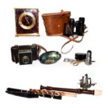 A tray of assorted including Astral quartz mantel timepiece, pair of cased binoculars marked Zuiho