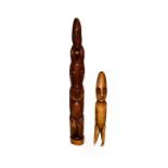 Two African vegetable ivory figures, Luba style, largest 34cm high (2)