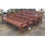 Four wooden slatback benches 250cm