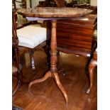 A 19th century mahogany snap-top pedestal tripod table, with scalloped dish top, 57cm by 75cm high