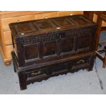 A period oak coffer on an associate two-drawer stand, 105cm by 43cm by 70cm . Coffer and base a
