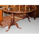 A Georgian mahogany D-end twin-pillar dining table with additional leaf, 117cm by 173cm (open) by