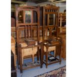 Two 1940's oak hallstands, both incorporating a mirror and glove box, largest 67cm by 24cm by