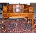 An American mahogany Carlton House style desk, with marquetry inlay, fitted