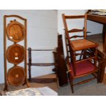 An inlaid mahogany folding cake stand together with a three tier mahogany hanging shelf, and two