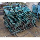 Approx. thirty painted metal folding garden chairs with wooden slats