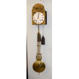 A French wall clock with pendulum