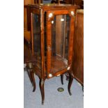 A French Kingwood vitrine of small proportions, with gilt metal and porcelain mounts, 52cm by 34cm