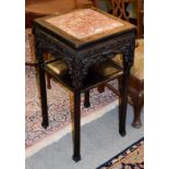 A Chinese 19th century carved hardwood and marble-top table, 42cm square by 80cm high . Marble