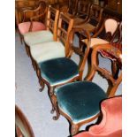 A pair of Victorian rosewood balloon-back dining chairs; another pair of oak dining chairs; and a