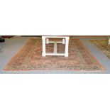 A Sultanabad carpet, West Iran, circa 1920, the soft terracotta field with an allover design of