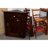 A George III oak hanging corner cupboard, 85cm by 95cm high together with an oak two-tier corner