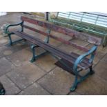 A green painted metal bench with wooden slats, Charles Wilkstead Kettering 240cm
