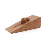 Workshop of Robert Mouseman Thompson (Kilburn): An English Oak Wedge, with carved mouse trademark,