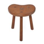 Cat and Mouseman: Lyndon Hammell (Harmby): An English Oak Cow Stool, on three octagonal legs, with