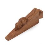 Workshop of Robert Mouseman Thompson (Kilburn): An English Oak Wedge, with carved mouse trademark,