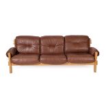 A 1970's Danish Three Seater Sofa, on a sledge base, 237cm wide 82cm deep 82cm high