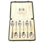 A Set of Six Art Deco Liberty & Co, Silver Teaspoons, each with stylised terminals, maker's mark L &