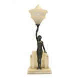 An Art Deco Spelter Figural Table Lamp, modelled as a nude young woman with right arm outstretched