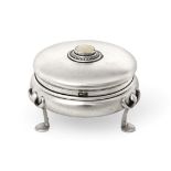 An Arts & Crafts Liberty & Co Silver Circular Box and Cover, the cover set with mother-of-pearl,