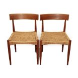 A Pair of 1960's Danish Mogens Kold Teak Dining Chairs, with woven seats, each labelled