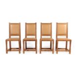 Rabbitman: A Set of Four Peter Heap (Wetwang) English Oak Dining Chairs, upholstered seats and