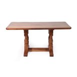 A Sid Pollard of Thirsk English Oak Refectory Dining Table, the adzed three plank top, on four