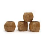 Workshop of Robert Mouseman Thompson (Kilburn): Four English Oak Napkin Rings, of standard octagonal