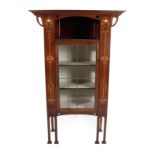 An Art Nouveau Leaded Glazed and Marquetry Inlaid Mahogany Display Cabinet, with an overhanging