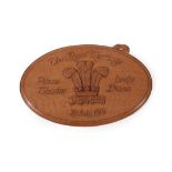 Workshop of Robert Mouseman Thompson (Kilburn): An English Oak Oval Wall Plaque, carved with the