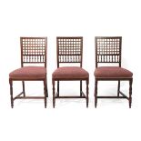 Three Aesthetic Movement Rosewood Chairs, with lattice panels and turned spindle backs,