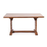 A Sid Pollard of Thirsk English Oak 5ft Refectory Dining Table, the rectangular top on two shaped