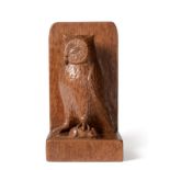 Robert Mouseman Thompson (1876-1955): An English Oak Table Brush Holder, carved as an owl holding