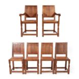 A Set of Six (4+2) Sid Pollard of Thirsk English Oak Panel Back Dining Chairs, studded tan leather