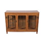 A Sid Pollard of Thirsk English Oak and Leaded Glazed Display Cupboard, the adzed rectangular top