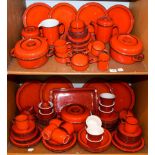 A large quantity of Thomas Flammfest red glazed cookware (two shelves)