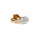 A diamond cluster ring, the four old cut diamonds in a square arrangement, in white claw and