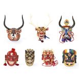 A collection of seven miscellaneous masks, 20th century in date, including Butanese, Nepalese and