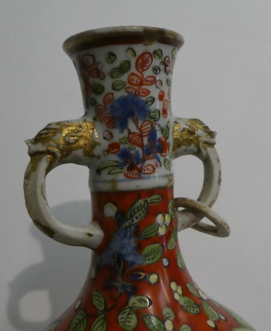 An 18th century Chinese vase of baluster form and with twin loop handles moulded with masks, painted - Image 6 of 11