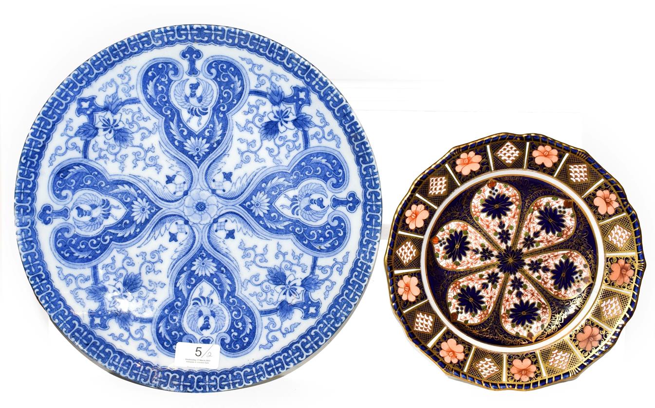 A Royal Crown Derby Imari plate, 23cm diameter and a Japanese blue and white dish, 31cm diameter (