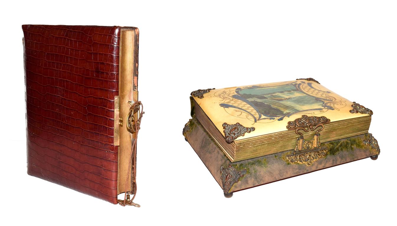 An Edwardian musical photograph album (empty) mounted in crocodile skin, together with a similar