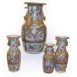 A pair of 19th century Cantonese vases painted with figures and two similar examples (4)