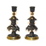 A pair of late 19th century parcel gilt bronze candlesticks 19cm (2)