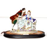 A Samson of Paris figure group with faux Chelsea anchor mark, 20cm wide by 18cm high