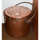 A 19th century copper vessel with cover and wrought iron swing handle, 29cm high not including the